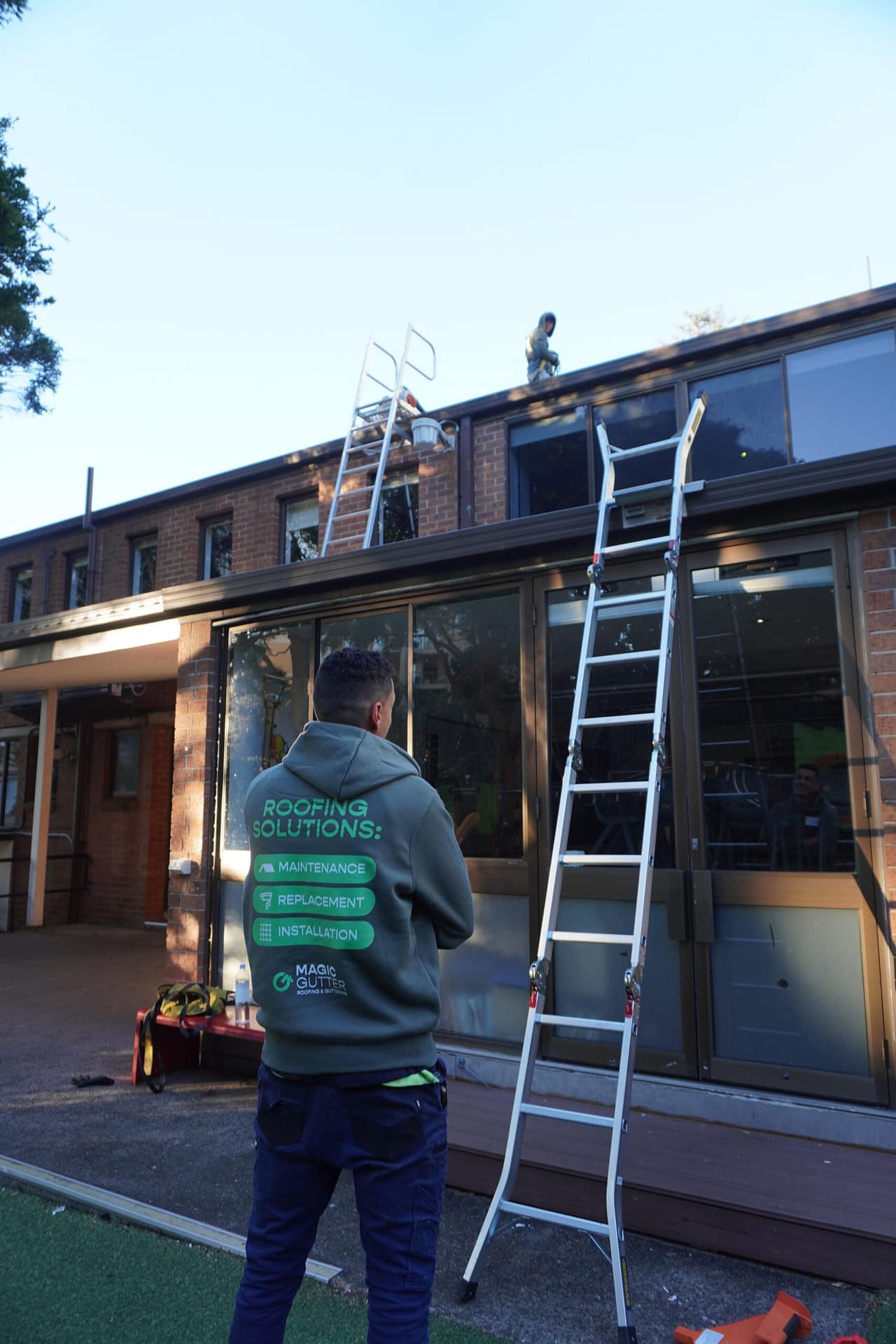 Magic Gutter technician safely working on a Sydney roof