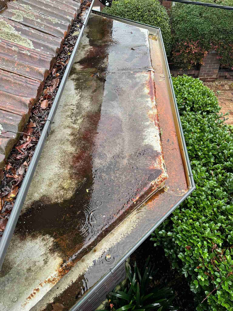 Corroded gutters and roof